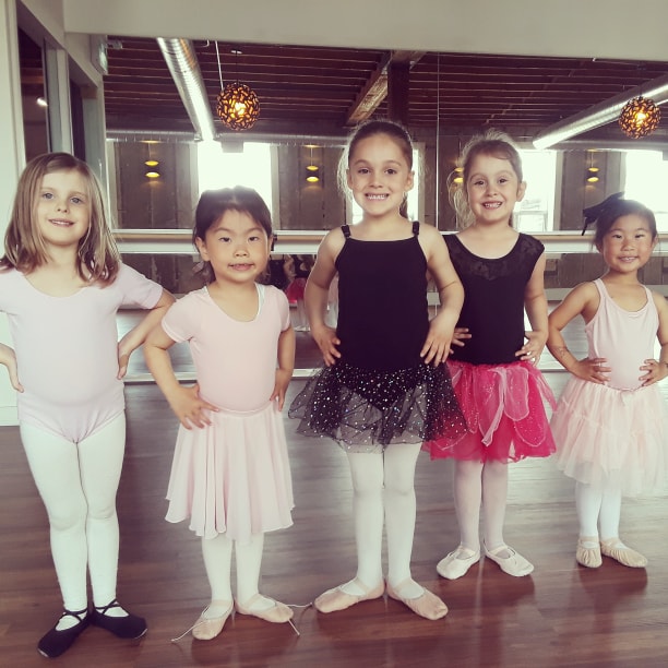 A kids dance class in Toronto where five kids are learning ballet