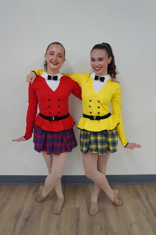 Two dance students in costume in a teen dance class in Toronto